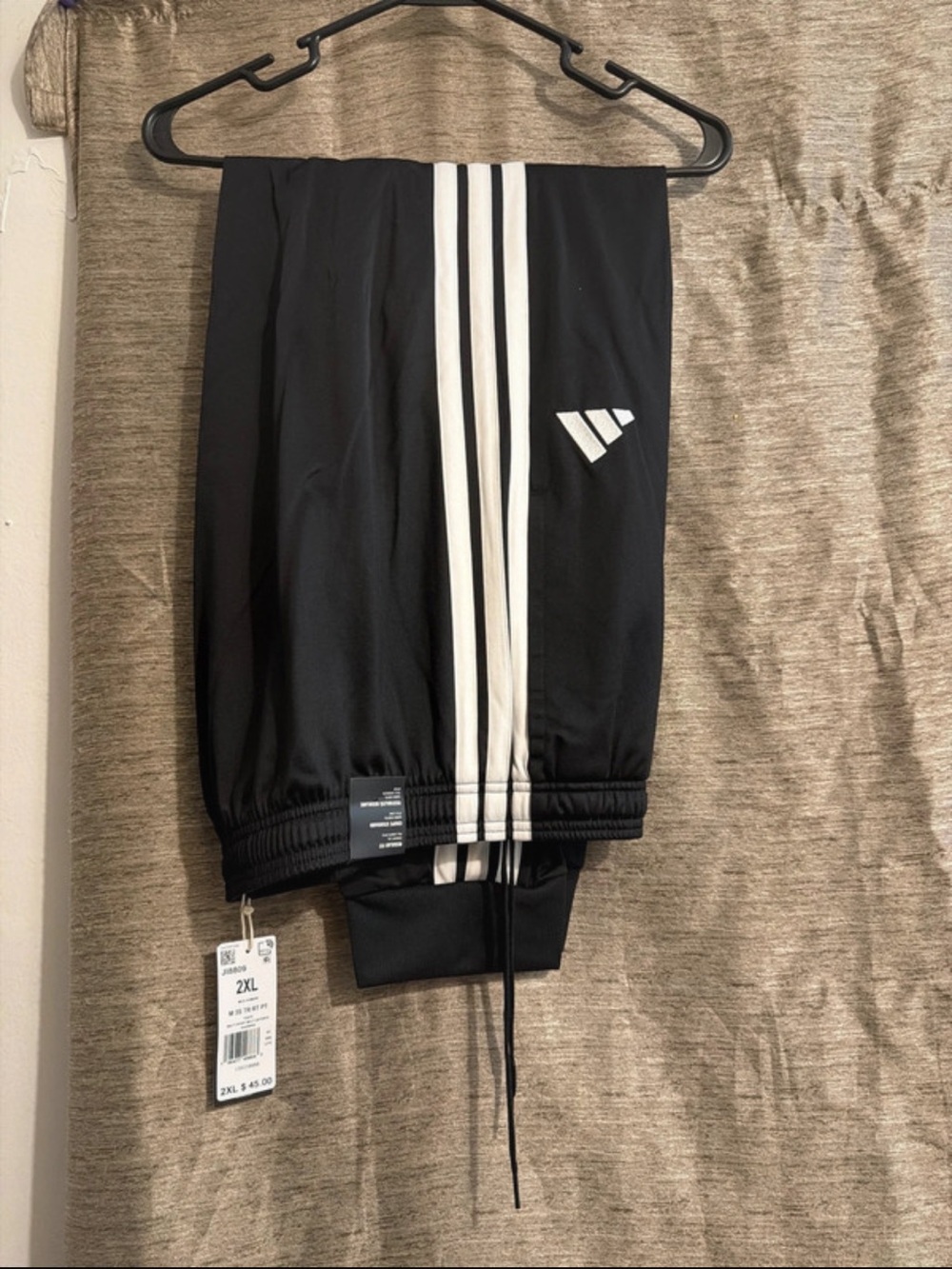 NWT. Men’s Adidas Black Athletic Track Pants with White Stripes